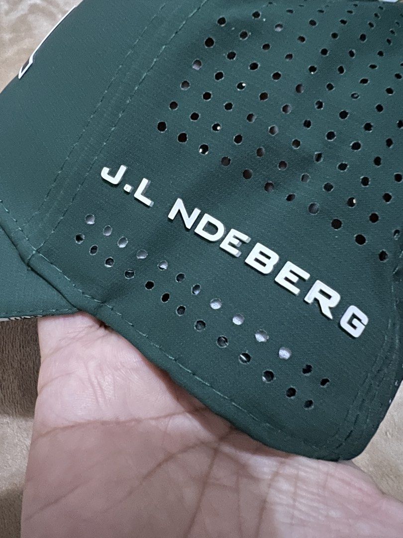 Titleist and j.lindeberg Golf Caps (Category: Caps & Hats) located in Binan City. Submitted by thetidyqueen (Listing ID 1470077296, Image 2). Description: - P800 each - Cap 1: White Titleist mesh trucker hat with black embroidered logo - Cap 2: Dark green J.Lindeberg cap featuring front bridge logo, perforated side branding, and metal plaque tag on the brim - Both items are clean and well-maintained - Great addition to any golfer's wardrobe - Fla