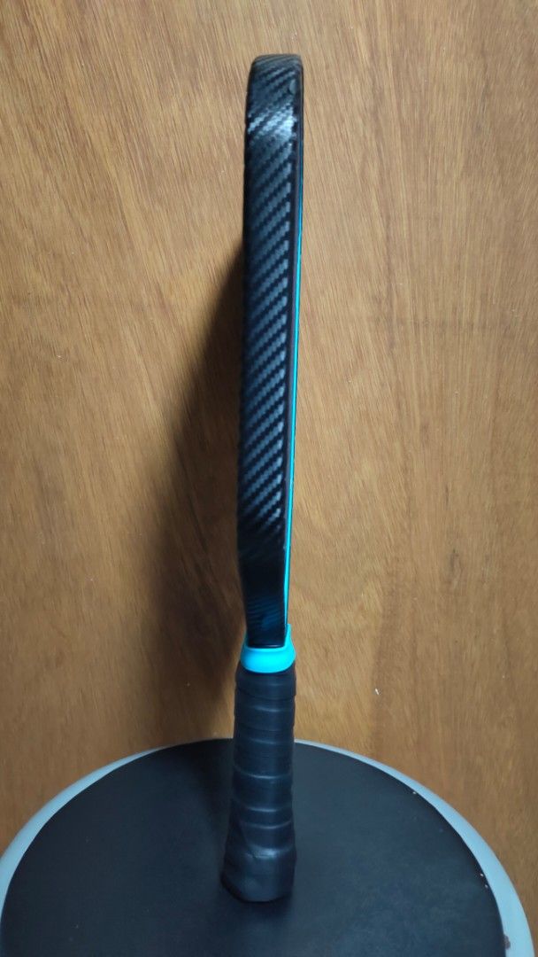 Tobys Pro Ares Pickleball Paddle (Category: Racket and Ball Sports) located in Malolos. Submitted by swiftwolf.b4d4a7 (Listing ID 1470047481, Image 3). Description: - Brand/Model: Tobys Pro Ares Pickleball Paddle - Thickness: 16mm for great touch and power - Material: Premium Kevlar aramid construction - Certification: USA Pickleball approved - Design: Blue and black colorway with sleek geometric triangle graphics - Handle: Wrapped with fresh bla