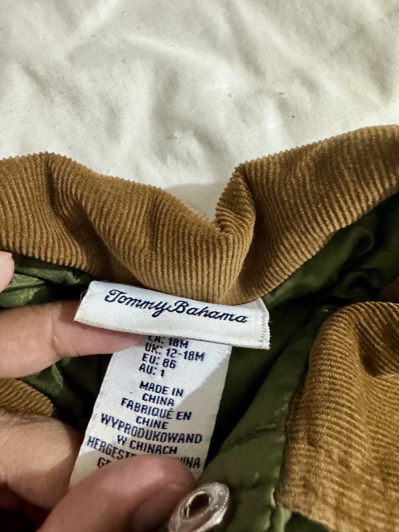 Baby Jacket (Category: Babies & Kids Fashion) located in Paranaque City. Submitted by april_anythingpreloved (Listing ID 1470083686, Image 2). Description: - Brand: Tommy Bahama - Size on tag: 12 to 18 months (EU 86) - Color: Brown with green lining - Closure: Convenient snap buttons - Condition/Details: Warm, cozy, and great for Tagaytay or Baguio trip - Bought in the US -RFS: Decluttering - Location: Paranaque .