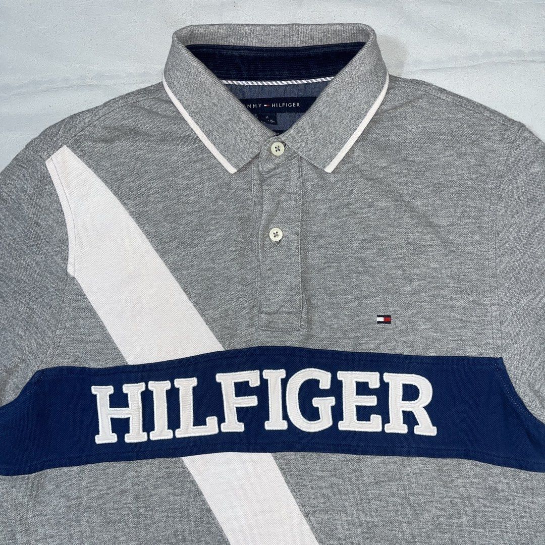Tommy Hilfiger Biglogo Poloshirt (Category: Tshirts & Polo Shirts ) located in Nasugbu. Submitted by janstuffs.ph (Listing ID 1470107267, Image 2). Description: Tommy Hilfiger. Big Logo Gray Poloshirt 💯Legit! Size: Medium on tag Width: 19.5" Length: 27" Condition: 10/10 Good as new Flaw: NONE Mine: 1080 •Buyer shoulder shipping fee - ship via j&t. •Read details before purchasing..