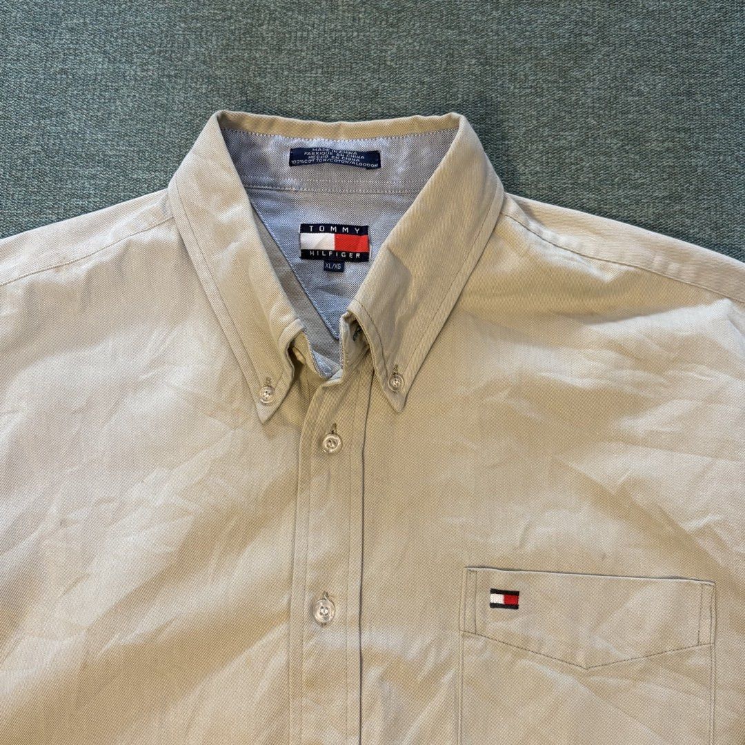 Tommy Hilfiger Buttondown (Category: Formal Shirts) located in Butuan. Submitted by ragscurations (Listing ID 1469964432, Image 3). Description: Tommy Hilfiger Button Down Polo Size : XL Inches : Width 22 Inches : Length 29 Condition : Good Flaws : Stain , Need wash Color rate 9.3 Fave item : Beautiful design .