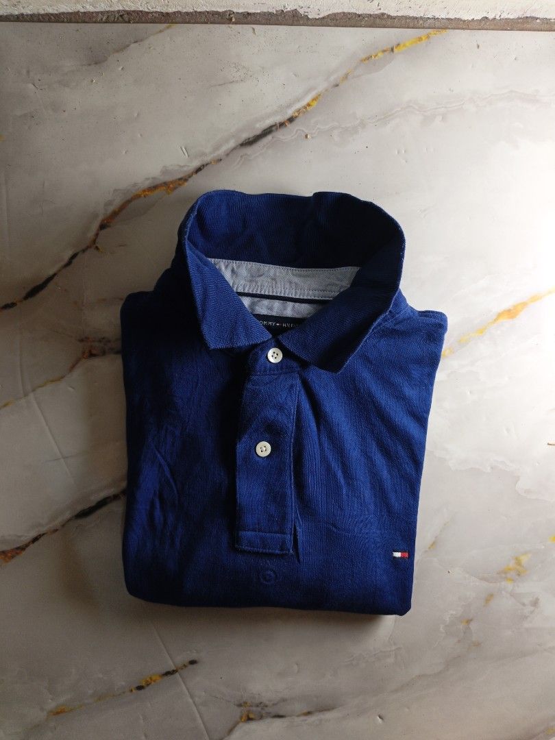 Tommy Hilfiger Royal Blue Fitted Polo (Category: Tshirts & Polo Shirts ) located in Nasipit. Submitted by zaynzdrip (Listing ID 1470139269, Image 2). Description: -good as new -no issue -no collar lines -medium on tag -22 width by 28 length.