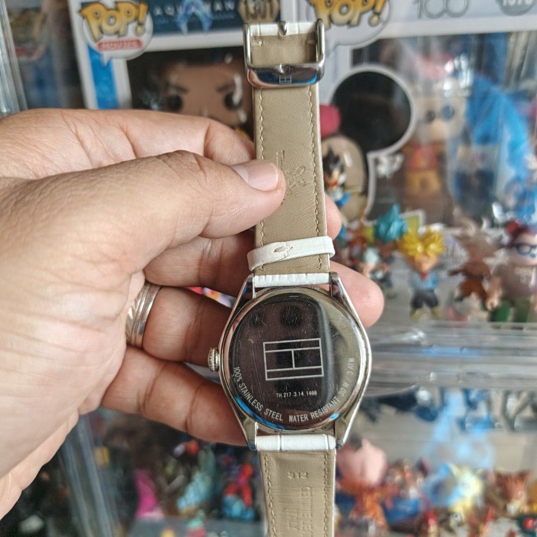 Tommy Hilfiger White Leather Strap Watch (Category: Women's Watches) located in Manila. Submitted by narju1234 (Listing ID 1469954455, Image 3). Description: - Brand: Tommy Hilfiger - Model: TH.217.3.14.1468 - Dial: Round white dial with silver-tone case and numerical markers at 12 and 6 - Strap: Genuine white embossed leather strap with buckle closure - Details: Stainless steel back case - Water Resistance: 30m / 3 ATM - Condition: 100% authenti