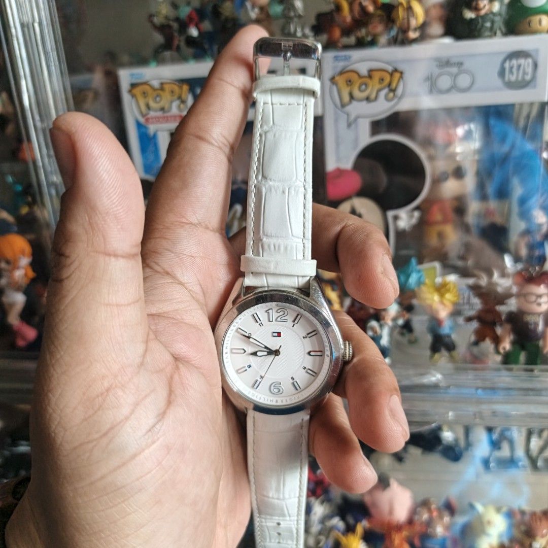 Tommy Hilfiger White Leather Strap Watch (Category: Women's Watches) located in Manila. Submitted by narju1234 (Listing ID 1469954455, Image 1). Description: - Brand: Tommy Hilfiger - Model: TH.217.3.14.1468 - Dial: Round white dial with silver-tone case and numerical markers at 12 and 6 - Strap: Genuine white embossed leather strap with buckle closure - Details: Stainless steel back case - Water Resistance: 30m / 3 ATM - Condition: 100% authenti