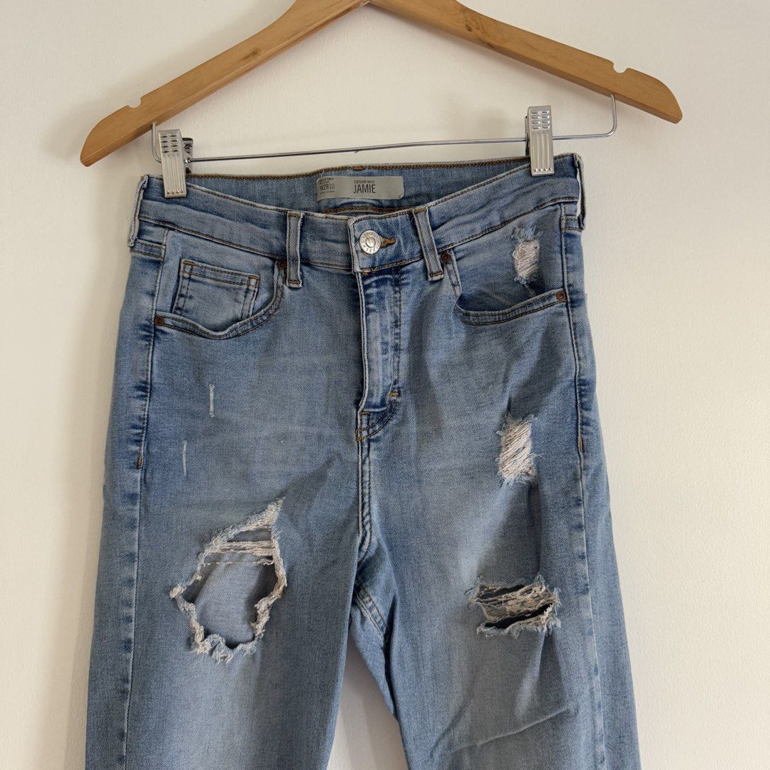Tooshop jamie ripped jeans (Category: Jeans) located in Manila. Submitted by apparella.ph (Listing ID 1469955987, Image 2). Description: 8.5/10 condition Waist.28-31( stretchable) Length:37 ☑️Everything is my Own preloved / BNWT/BNWOT ☑️ not thrifted/Ukay ☑️ malukot sa picture kasi na stock sa cabinet (tinatamad mag plantsa ✌️ ) ☑️Personal items ( usually bought in US/UK/JPN ) every year po ako nag aabroad so expect i don’t sell fake items and me