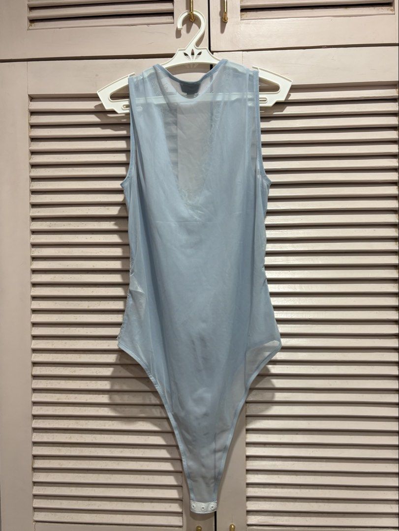 Topshop Light Blue Lace Bodysuit (Category: Sleeveless) located in Muntinlupa City. Submitted by sukimum (Listing ID 1469985412, Image 2). Description: Worn thrice (with underwear on) No issues on the lace panels, fabric is still gorgeous. Great for nights out.
