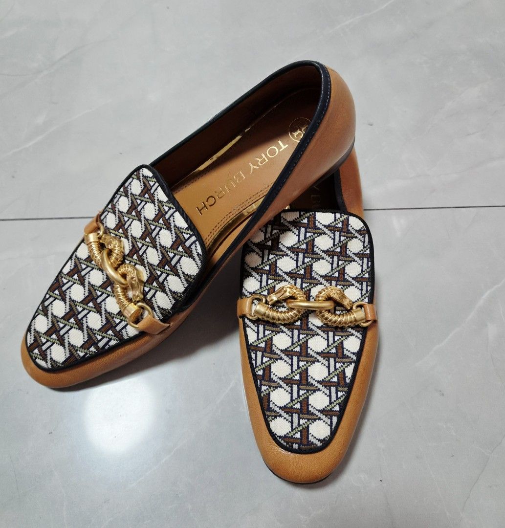 Tory Burch Jessa Loafers Size 9M (Category: Loafers) located in Caloocan City. Submitted by imladris1016 (Listing ID 1469983051, Image 1). Description: - Brand: Tory Burch - Style: Classic slip-on loafers - Color/Material: Brown and patterned fabric, Leather Upper and Sole - Hardware: Gold-tone detail across the front - Size: 9M - Condition: Good pre-loved condition; leather soles show minimal wear from previous use - Perfect for office wear, cas