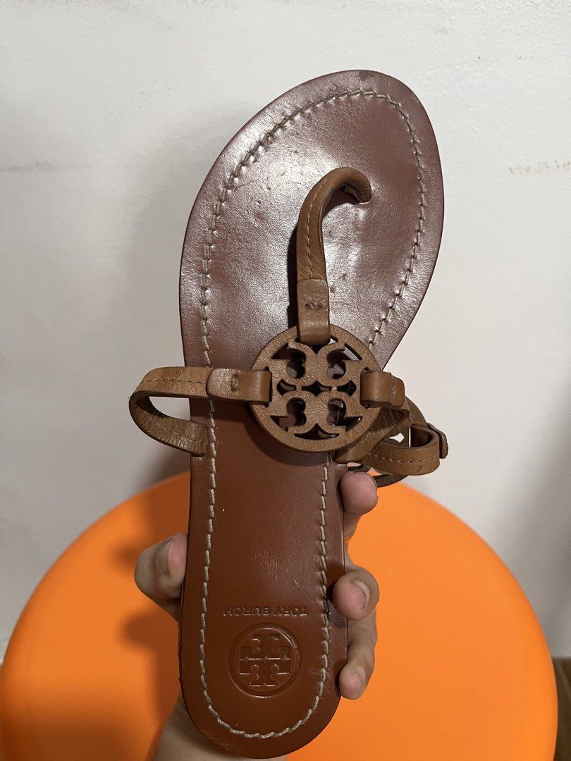Tory Burch Miller Leather Sandals Tan (Category: Flats & Sandals) located in Valenzuela. Submitted by sofiasticated.decluttering (Listing ID 1470001401, Image 3). Description: - Brand: Tory Burch - Style: Miller Thong Sandals - Color: Tan leather with white contrast stitching - Details: Iconic cutout double T logo, stamped heel logo, flat heel style ✅ SIZE: EU 38 23.5 -24cm US7 ✅PRE- OWNED and NOT suitable for picky buyers, ✅EXCELLENT CONDITION ‼