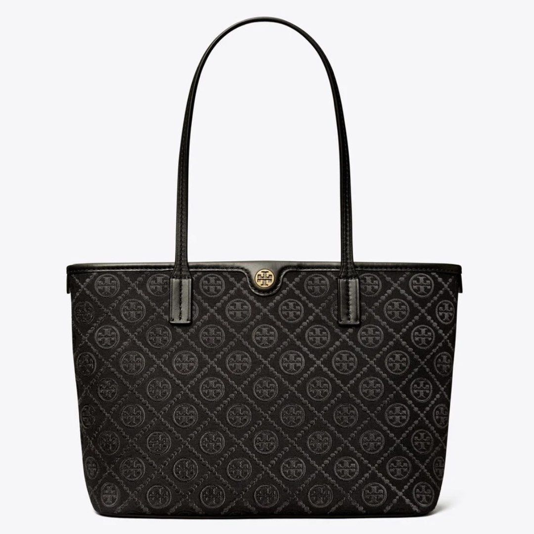 Tory Burch Small T Monogram Zip Tote (Category: Tote Bags) located in Paranaque City. Submitted by _ngllou (Listing ID 1470084462, Image 2). Description: Tory Burch Small T Monogram Zip Tote ↪︎ Authentic Tory Burch Small Tote Bag ↪︎ Height: 9.3” (23.5cm); length: 12” (30.5cm); depth: 5” (12.8cm) ↪︎ Fits a laptop up to 13” ↪︎ Jacquard; napa leather trim ↪︎ Zipper closure ↪︎ Top handle with 9.3” (23.5cm) drop ↪︎ 1 interior hanging zipper pocket ↪︎ 