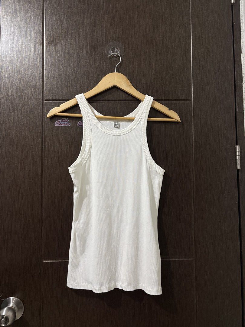 TOTEME RIBBED TANK TOP (Category: Luxury Apparel) located in Naga. Submitted by sislovesme (Listing ID 1470066564, Image 1). Description: •9/10 CONDITION •NO FLAWS •SIZE MEDIUM •W 14 INCHES •L 24 INCHES.