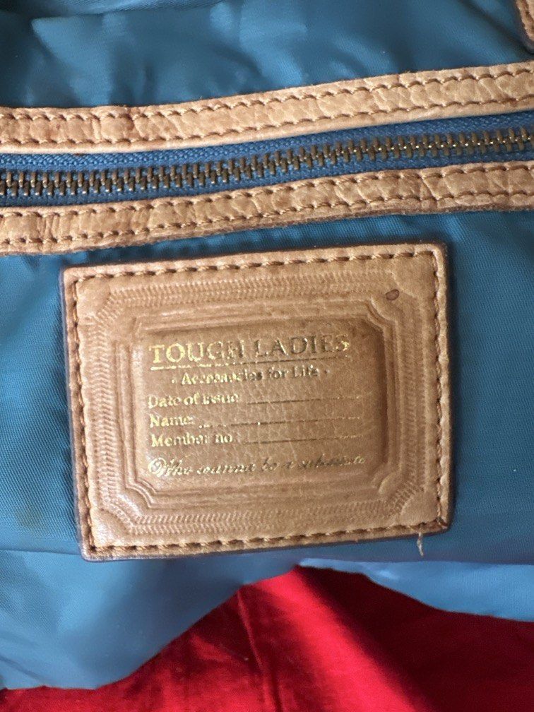Tough Jeansmith nylon utility tote bag (Category: Shoulder Bags) located in Caloocan City. Submitted by hariel_beverly_onlineshop (Listing ID 1469997180, Image 2). Description: an authentic Tough Jeansmith nylon utility tote bag. This vintage piece from the iconic Hong Kong streetwear brand features durable blue-green nylon fabric contrasted with robust tan leather trim, multiple external organizer pockets, and heavy-duty industrial hardware..