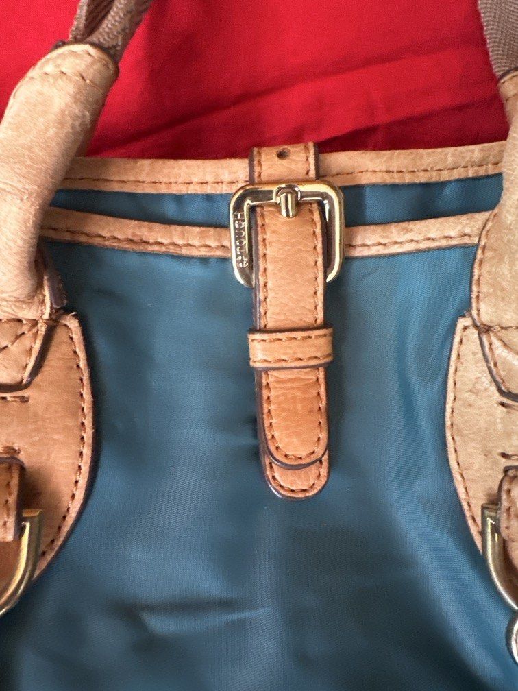 Tough Jeansmith nylon utility tote bag (Category: Shoulder Bags) located in Caloocan City. Submitted by hariel_beverly_onlineshop (Listing ID 1469997180, Image 3). Description: an authentic Tough Jeansmith nylon utility tote bag. This vintage piece from the iconic Hong Kong streetwear brand features durable blue-green nylon fabric contrasted with robust tan leather trim, multiple external organizer pockets, and heavy-duty industrial hardware..