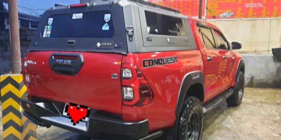 Toyota Hilux CONQUEST V 2.4 Auto (Category: Used Cars) located in Mandaluyong City. Submitted by bagsncoffee_1 (Listing ID 1469964320, Image 2). Description: Top of the line emotional red Complete papers Casa maintained, you can check it with toyota Buyer will have up to 20k mileage of free oil change covered by the warranty. Almost brandnew 360 camera Sensor all working Not flooded or bangga 400 thousands worth of upgrade Bf goodrich tires almos