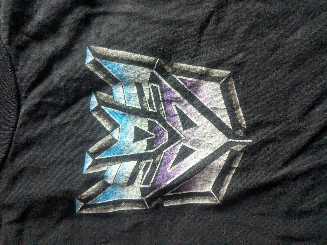 transformers deception vintage 90's tshirt xl (Category: Tshirts & Polo Shirts ) located in Manila. Submitted by ltdshop808 (Listing ID 1470046313, Image 3). Description: transformers deception vintage 90's tshirt xl made in El Salvador fotl tag used good condition black color thick fabric cotton wyswyg silkscreen print came from USA unisex price p2899 payment via gcash free shipping.