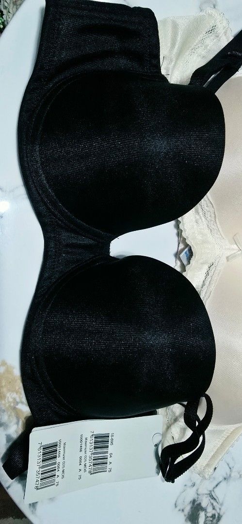 Trick or Treat Sale 💯 Triumph Invisible Multiway T-Shirt Bra Black (Category: Undergarments & Loungewear) located in Manila. Submitted by ubasirene (Listing ID 1470081454, Image 2). Description: - Brand: Triumph - Condition: Brand new with original tag attached - Color: Classic Black - Size: A 75 - Style: Multiway t-shirt bra (can be worn standard or strapless) - Features: Adjustable straps and smooth fabric that is invisible under tight clothes