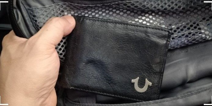 True Religion (RFID) Black Leather Bi-fold Wallet (FREE: BODYSAC Wallet) (Category: Wallets & Card Holders) located in Baguio. Submitted by monsterdog007 (Listing ID 1468061934, Image 2). Description: - Authentic True Religion black leather bi-fold wallet - Multiple card slots on both sides for easy organization - Inside features a striking red patterned fabric lining with brand text - Built-in RFID protection to keep your cards secure - Sturdy c