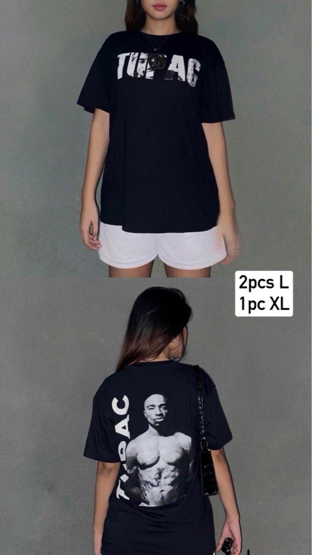 Tupac Graphic Print Black T-Shirt (Category: Tshirts & Polo Shirts ) located in Manila. Submitted by jhane.micha (Listing ID 1470070875, Image 1). Description: - Color: Black - Design: Front text branding with large back print Tupac portrait - Fit: Relaxed, oversized streetwear style - Sleeves: Short sleeves - Sizes Available: L and XL - Styling: Pairs easily with jeans or shorts - Promos: Message us for bundle deals and size availability.