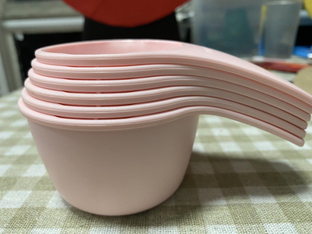 Tupperware Pink Measuring Cups Set of 6 (Category: Coffee & Tea Tableware) located in Cavite. Submitted by yc.shoppemnl (Listing ID 1469998198, Image 3). Description: - Authentic Tupperware pink measuring cups set - Includes 6 handy sizes: 60ml, 80ml, 120ml, 160ml, 180ml, and 240ml - Made with durable, high-quality plastic - Stackable design for easy and neat storage - Clean, sanitized, and ready to use.