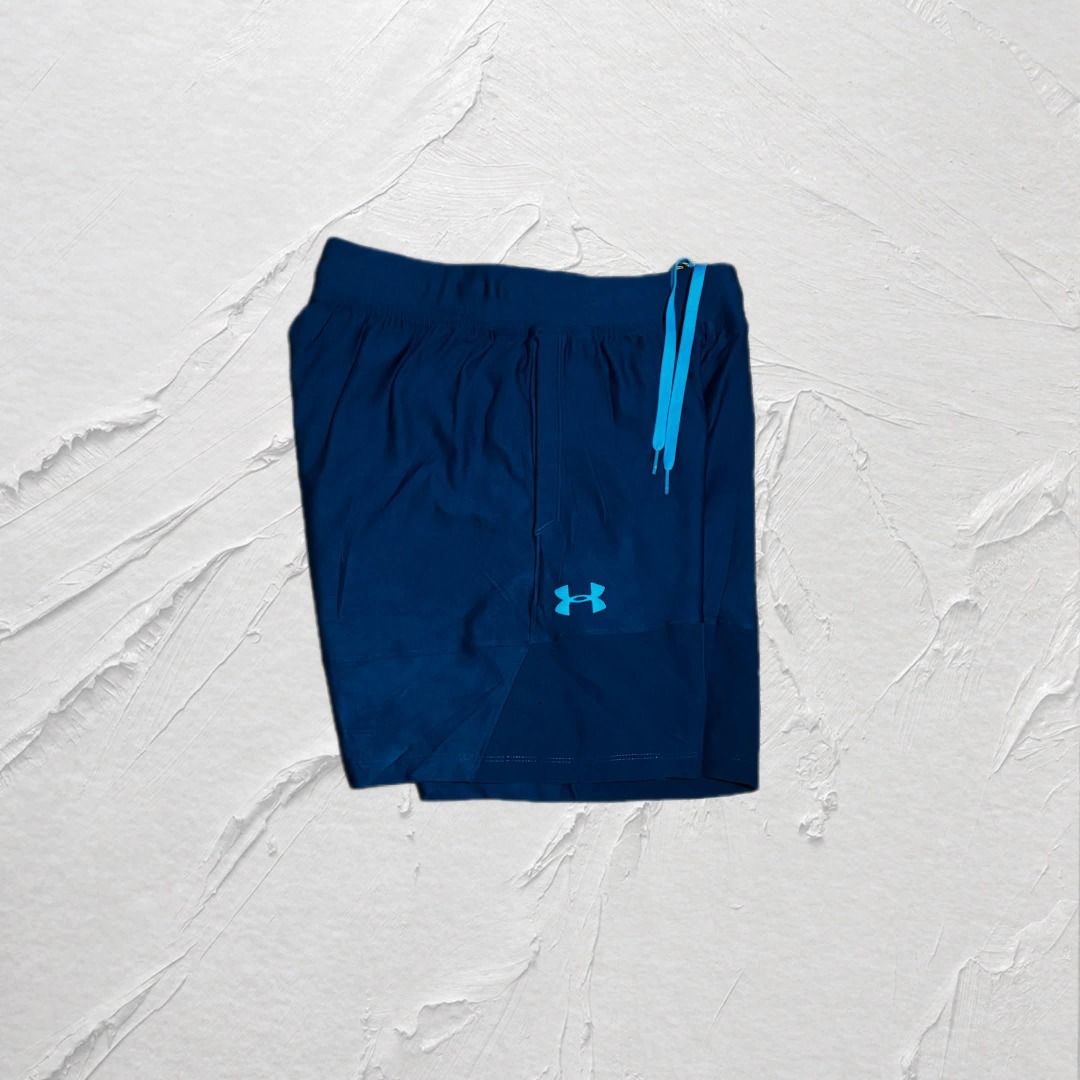 Under Amour Blue Running Shorts Men's (Category: Shorts) located in Mandaue City. Submitted by leroysky_stuffs (Listing ID 1470037826, Image 1). Description: INFORMATIONS/DETAILS 📝 -Size Medium on tag 28-34 waistline strechable 17 length (above the knee) -As new condition, near brandnew 💯 ✨ -Bagong bago pa mga sir, hangtag nlng kulang, maganda for running or exercises -No issues -Negotiable for sure buyer only po ✅ DM ME TO PURCHASE 📩 ▪️ Can d