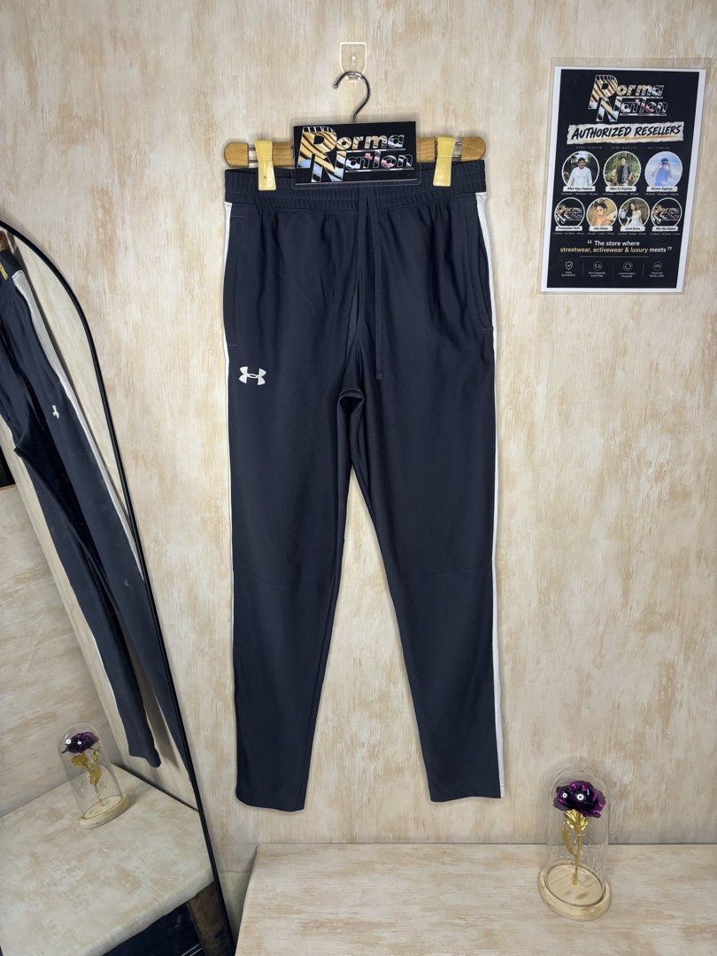 UNDER ARMOUR EMBROIDERED LOGO TRACK PANTS (Category: Joggers) located in Cabuyao City. Submitted by pormanation-thrift-store (Listing ID 1469998040, Image 1). Description: UNDER ARMOUR EMBROIDERED LOGO TRACK PANTS Condition: LIKE NEW Color rate: 10/10 Size: LARGE Dimes: 30-34”Wx39”L Issue: NONE‼️ Price: 1500.