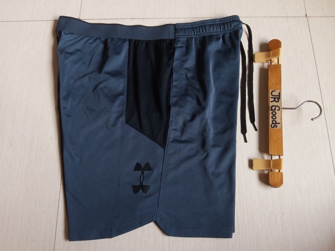 Under Armour HeatGear Fitted Athletic Shorts (Category: Shorts) located in Tanay. Submitted by jrgoods (Listing ID 1470110334, Image 1). Description: UA DRI-FIT short Xxl Waistline 36-42 Length 20 Good as new condition 599+ship Tanay Rizal location Shipping Nationwide - Color: Dark grey with black mesh panels - Technology: HeatGear to keep you cool during intense workouts - Features: Elastic waistband with adjustable drawstring and iconic logo ne
