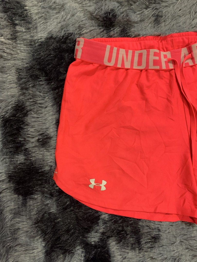 Under Armour HeatGear Women's Athletic Shorts Medium (Category: Activewear) located in Iba. Submitted by thriftcoyan (Listing ID 1470003473, Image 2). Description: - Brand: Under Armour - Item: HeatGear Athletic Shorts - Color: Bright Pink - Size: Medium -31-33 - Fit: Loose fit with elastic waistband and functional drawstring - Details: Large printed branding on waistband, UA logo on lower left hem - Material: Lightweight performance fabric - Ori