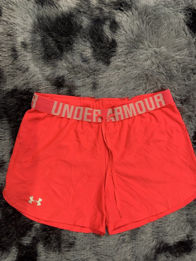 Under Armour HeatGear Women's Athletic Shorts Medium (Category: Activewear) located in Iba. Submitted by thriftcoyan (Listing ID 1470003473, Image 3). Description: - Brand: Under Armour - Item: HeatGear Athletic Shorts - Color: Bright Pink - Size: Medium -31-33 - Fit: Loose fit with elastic waistband and functional drawstring - Details: Large printed branding on waistband, UA logo on lower left hem - Material: Lightweight performance fabric - Ori