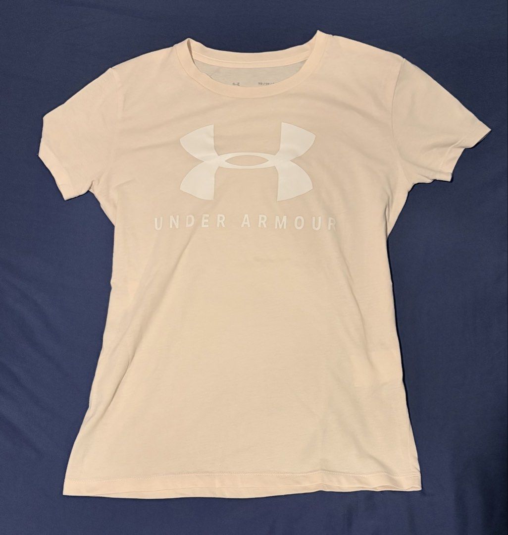Under Armour The Classic Tee Pink XS (Category: Shirts) located in Manila. Submitted by urban.refinds (Listing ID 1470008094, Image 1). Description: - Brand: Under Armour - Color: Light pink with large white chest logo - Size: XS - Material: Super soft cotton blend - Ideal for: Workouts or casual daily wear.