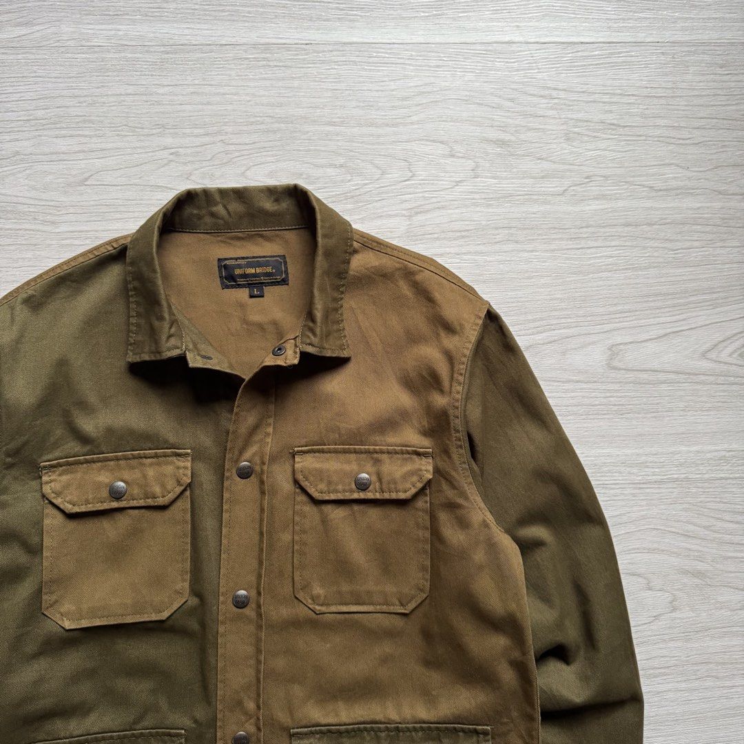 Uniform Bridge Cotton Camp Jacket Mixed (Category: Coats, Jackets and Outerwear) located in Zamboanga. Submitted by rustic.rev (Listing ID 1470075026, Image 2). Description: Uniform Bridge Cotton Camp Jacket Mixed In excellent condition Tagged: L Actual Measurements: Pit to pit: 22” Length: 28.5” Shoulders: 19” Sleeves length: 25”.
