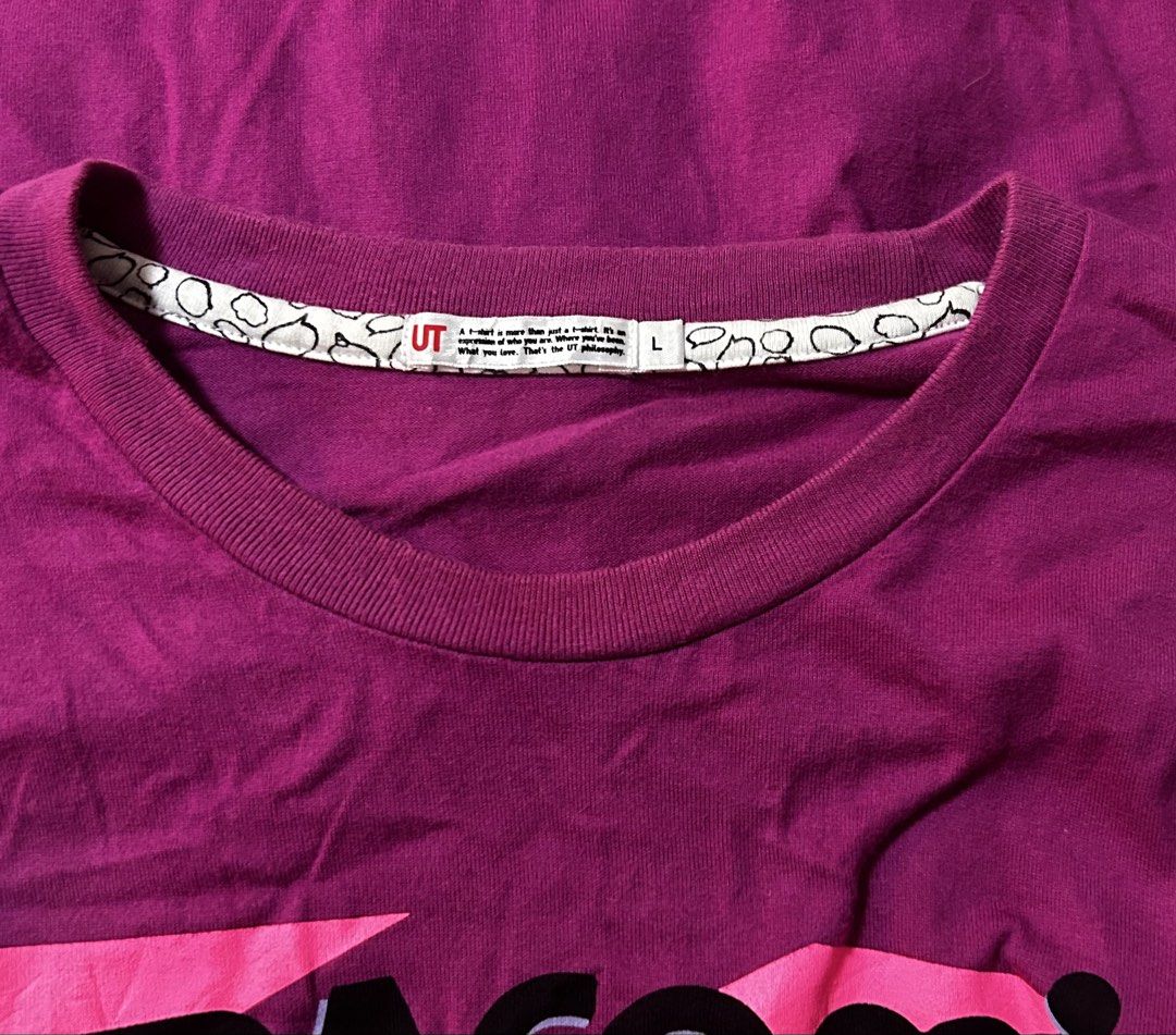 UNIQLO (Category: Shirts) located in Davao. Submitted by sart0ria85 (Listing ID 1470106028, Image 3). Description: Dark fuschia pink with a bold comic-style front print and neat interior collar tape details. 100% COTTON MADE IN CHINA 🇨🇳 LARGE. Size 8 EXCELLENT CONDITION (94/100).