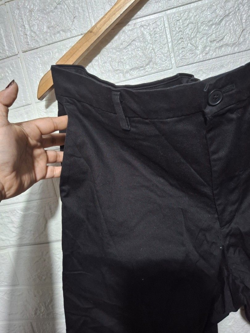 Uniqlo Black Pants Size 91cm (Category: Trousers) located in Angeles City. Submitted by livemountain.e2ae07 (Listing ID 1470025943, Image 3). Description: - Brand: Uniqlo - Color: Classic Black - Waist: 91cm - W18 L39 HEM 7.4 - Material: 97% cotton, 3% polyurethane (features a comfortable stretch) - Fit: Regular fit - Closure: Standard button fly - Design: Clean stitching, versatile everyday trousers that easily match any shirt or shoes.