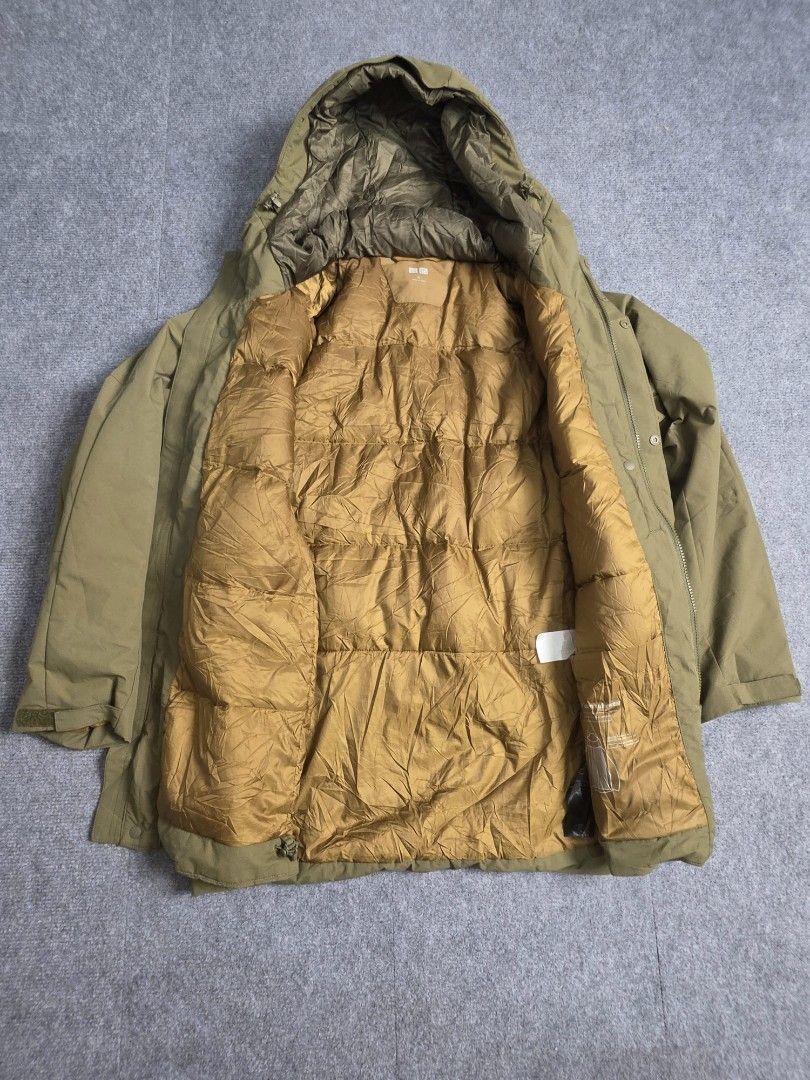 Uniqlo Hybrid Down Puffer (Category: Coats, Jackets and Outerwear) located in Baguio. Submitted by labelleferroniere (Listing ID 1470075850, Image 2). Description: XL Mens ( Olive ) No Flaw , In As New Condition Measurement declared (photos).
