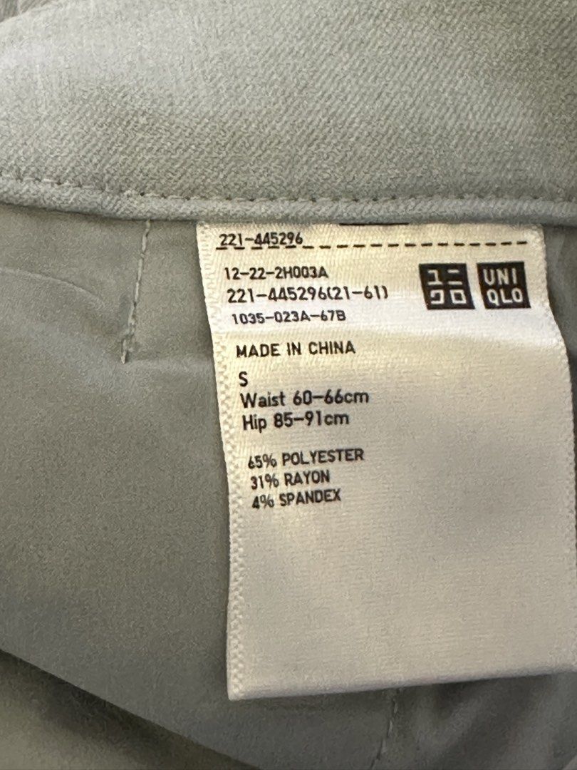 Uniqlo Light Blue Trousers Size S (Category: Other Bottoms) located in Manila. Submitted by lisainthesun (Listing ID 1469959863, Image 2). Description: - Brand: Uniqlo - Color: Light Blue - Size: S (Fits waist: 60-66 cm, Hips: 85-91 cm) - Material: 65% polyester, 31% rayon, 4% spandex (slight stretch) - Fit: Straight leg with professional front center creases - Details: Standard belt loops, zipper fly, functional side pockets, and two back welt p