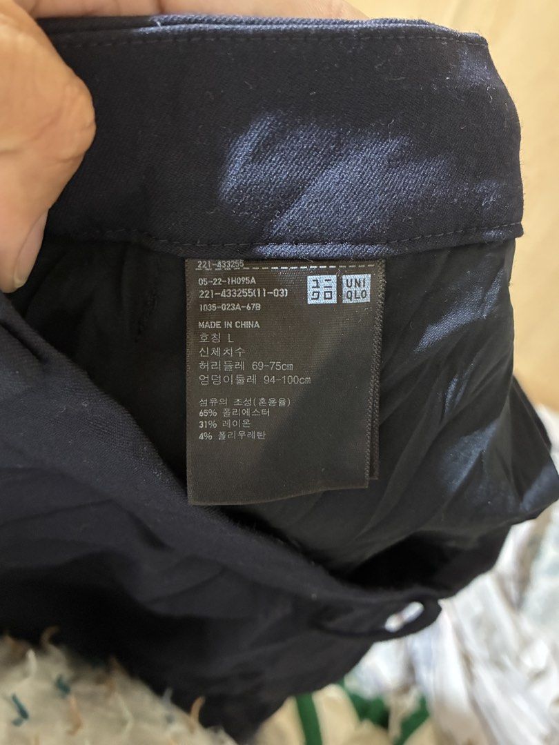 Uniqlo Navy Trousers Size L (Category: Trousers) located in Placer. Submitted by talaalond61563 (Listing ID 1470048204, Image 3). Description: - Brand: Uniqlo - Color: Navy - Size: L - Material: 65% Polyester, 31% Rayon, 4% Polyurethane (with comfortable stretch) - Waist Fit: 69 to 75 cm - Hip Fit: 94 to 100 cm - Fit: Straight leg - Features: Belt loops, standard pockets - Origin: Made in China - Condition: Great for office and casual wear!.
