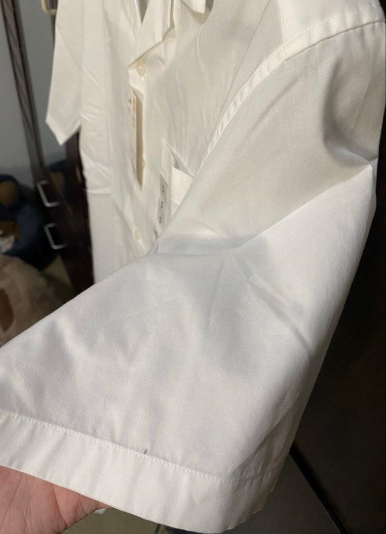 Uniqlo polo (Category: Tshirts & Polo Shirts ) located in Taguig. Submitted by jarellmrsgn (Listing ID 1470099106, Image 3). Description: - Brand: Uniqlo - Style: Open collar short sleeve shirt - Color: White - Size: Small - Condition: Brand new with original retail tags attached - Retail Price: ₱1,290.