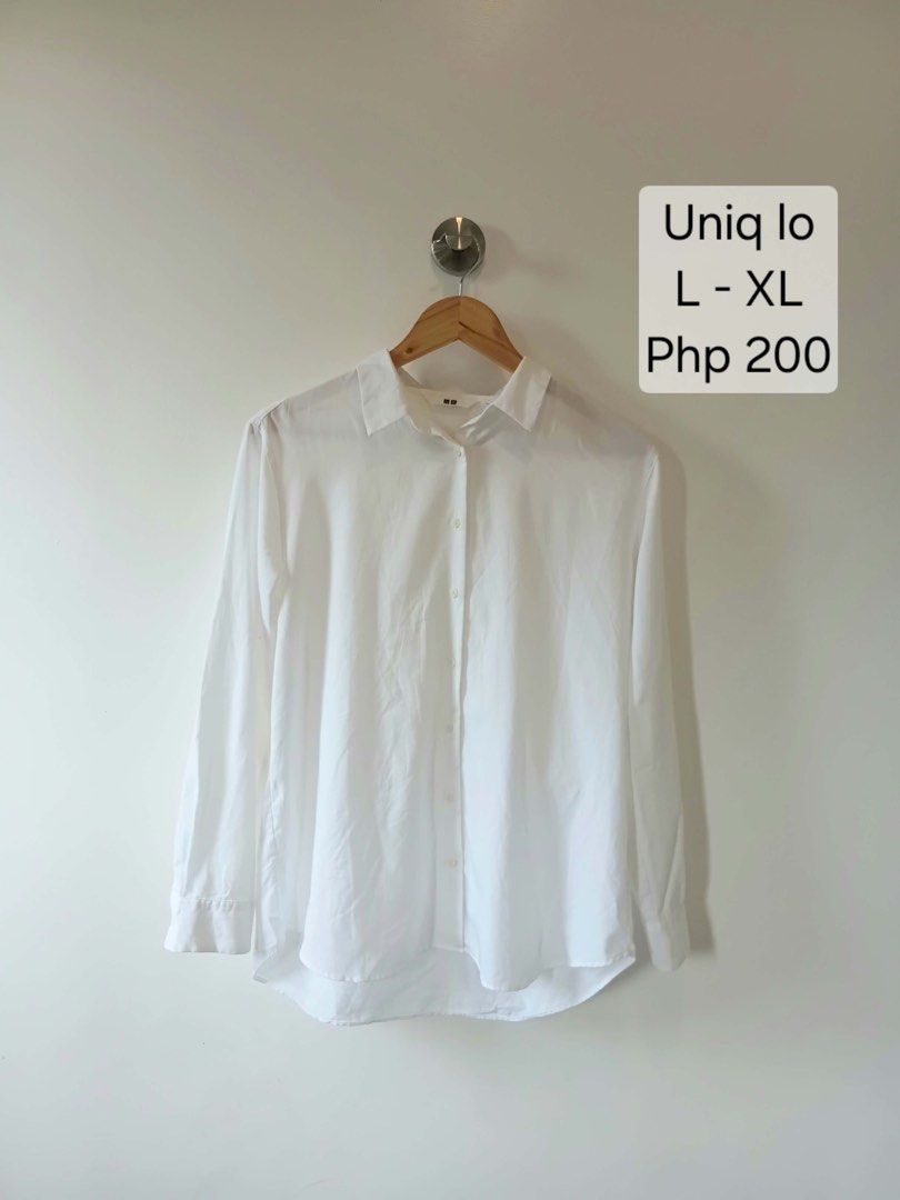 Uniqlo White Long Sleeve Button-Down Shirt (Category: Longsleeves) located in Antipolo. Submitted by wisecat.4a7eea (Listing ID 1470077892, Image 1). Description: - Brand: Uniqlo - Item: Classic White Button-Down Shirt - Size: L - Material: 76% rayon, 24% polyester - Features: Long sleeves with cuffs, collar neck, front button closure - Style: Clean minimalist design - Condition: Excellent/Clean - Perfect for: Office wear, interviews, or casual e