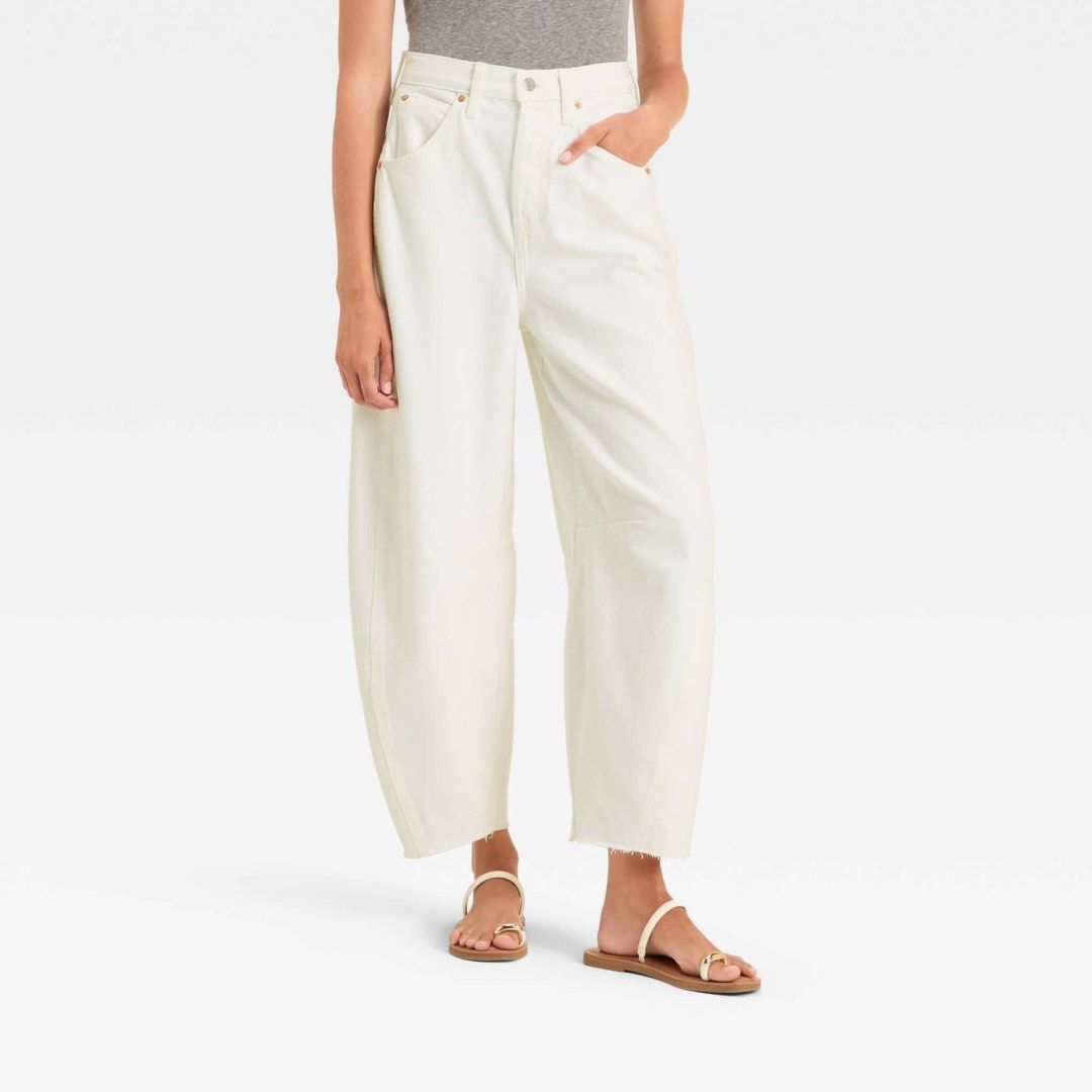 Universal Thread High Rise Curved Leg Jean White Size 14 (Category: Jeans) located in Manila. Submitted by thrifty111 (Listing ID 1470091270, Image 1). Description: - Brand: Universal Thread - Style: High rise curved leg / balloon silhouette with raw cropped hem - Color: White - Size: 14 Regular - Fit: Relaxed through the hip - Details: Classic five-pocket styling, copper tone rivets, front button closure - Condition: Brand new with tags (BNWT) s