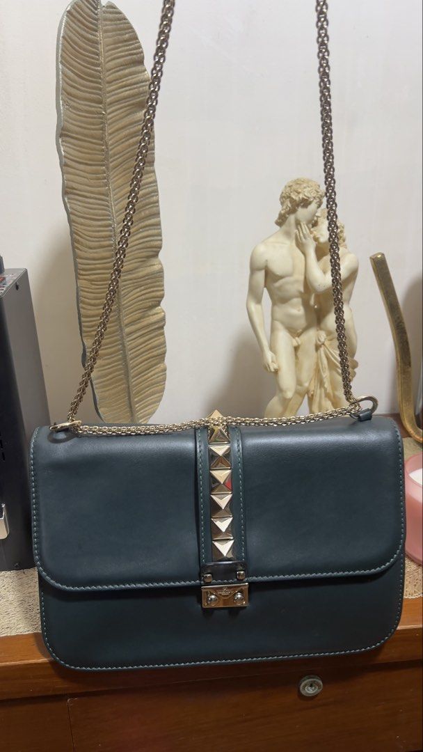 Valentino garavani (Category: Luxury Bags & Wallets) located in Paranaque City. Submitted by safepenguin-0628 (Listing ID 1470088264, Image 3). Description: Authentic Valentino Garavni gm size gold hardware Dual Army green color With authenticity card With dustbag .