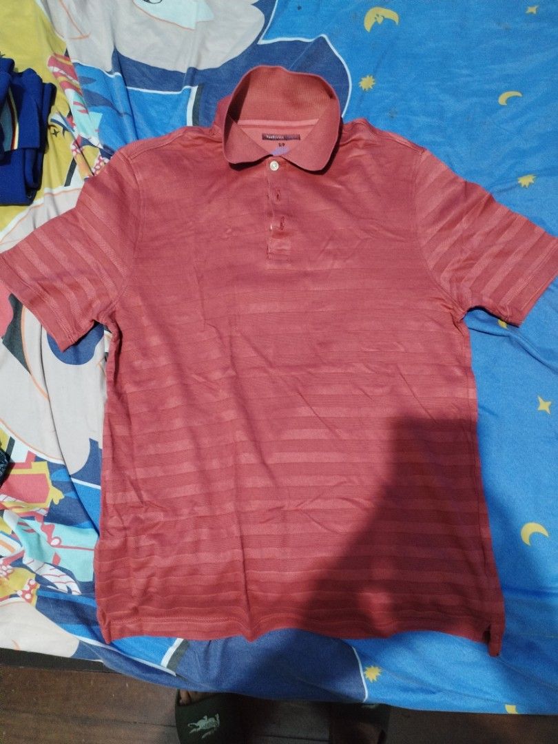 Van Heusen Polo Shirt (Category: Tshirts & Polo Shirts ) located in Manila. Submitted by solebrothers2826 (Listing ID 1470101841, Image 1). Description: - Brand: Van Heusen Studio - Size: S (Slim Fit) - Color: Dusty pinkish red - Material: Lightweight with all-over striped texture - Features: Standard button placket, neat collar, and clean inner tags - Condition: Excellent / Great for casual wear.
