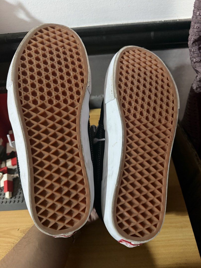 Vans Skate Half Cab (Category: Sneakers) located in Quezon City. Submitted by djrakrakantodamax (Listing ID 1469965383, Image 3). Description: - Brand: Vans Skate Half Cab - Color: Black and White - Style: Mid-top with signature side patch and heel checkerboard tag - Condition: Great pre-loved condition with minimal wear on the rubber waffle outsoles - Includes: Clean white laces - Durability: Solid skate shoes with plenty of life left.