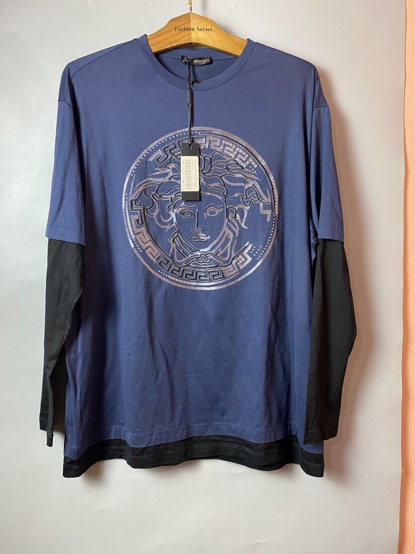 Versace Sweatshirt/ Embroided Big Logo (Category: Coats, Jackets and Outerwear) located in Quezon City. Submitted by loloyz123 (Listing ID 1470076632, Image 1). Description: Versace Sweatshirt/ Embroided Big Logo Condition: Very good Color rate: 10/10 Color: Navy/ Blue Size: Medium L: 29 W: 23 inches.
