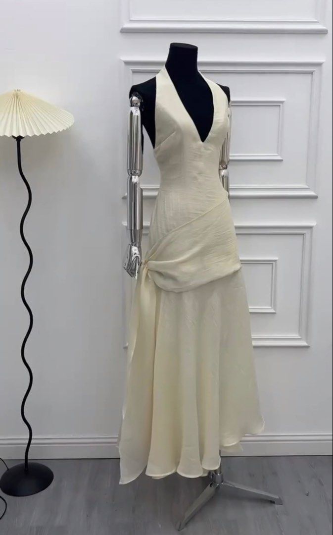 Vietnam Halter Dress (Category: Dresses) located in Pasig City. Submitted by pattycakez (Listing ID 1469970526, Image 2). Description: Purchased from Vietnam Size: small Color: cream Brand new.