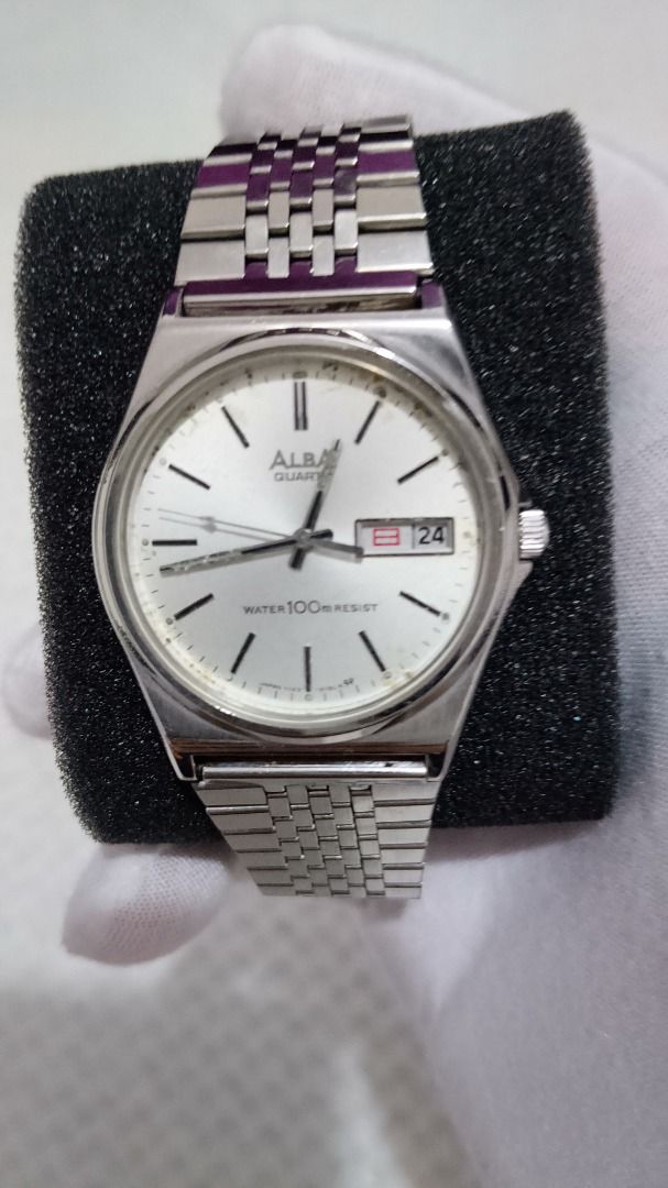 Vintage Alba Unisex Watch – Silver Dial (Category: Men's Watches) located in Malolos. Submitted by chrono_revival (Listing ID 1470044824, Image 1). Description: PLEASE READ THE FULL POST BEFORE SENDING ANY INQUIRIES. SERIOUS OFFERS ONLY PLEASE. ********** Authentic Alba Y143-8141 - Stainless Steel Quartz Watch - manufactured 1996 - Silver dial with slight patina formation at the edges consistent with its age - Kanji day + date display - Original 