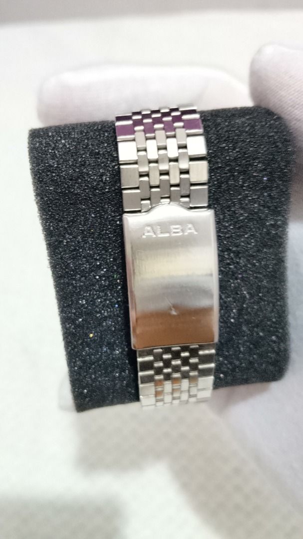 Vintage Alba Unisex Watch – Silver Dial (Category: Men's Watches) located in Malolos. Submitted by chrono_revival (Listing ID 1470044824, Image 3). Description: PLEASE READ THE FULL POST BEFORE SENDING ANY INQUIRIES. SERIOUS OFFERS ONLY PLEASE. ********** Authentic Alba Y143-8141 - Stainless Steel Quartz Watch - manufactured 1996 - Silver dial with slight patina formation at the edges consistent with its age - Kanji day + date display - Original 