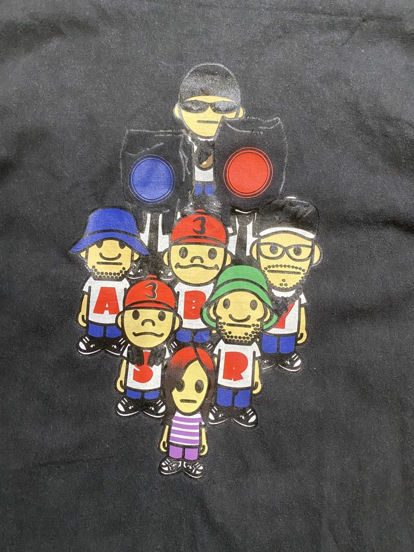 Vintage bape head 2003 tee (Category: Tshirts & Polo Shirts ) located in Manila. Submitted by switchcity (Listing ID 1470076093, Image 2). Description: - Brand: A Bathing Ape (BAPE) - Color: Black - Material: 100% Cotton - Fit: Regular fit, short sleeves - Design: Classic character graphic on chest - Details: Small woven ape tag on left sleeve, branded neck label - Condition: Minor fading from regular washing.