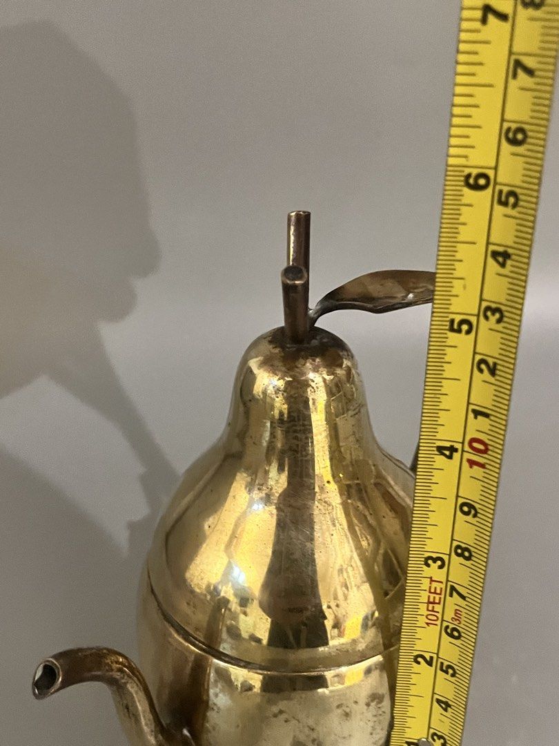 Vintage Brass Mini Pear Teapot (Category: Other Home Decor) located in Taguig. Submitted by frank63studio (Listing ID 1469988035, Image 3). Description: Vintage Brass Mini Pear Teapot 985php it can also be used as trinket box or display it as is unpolished 5.5" with tarnish and small dents.