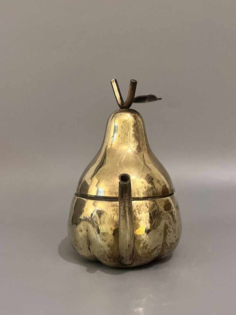 Vintage Brass Mini Pear Teapot (Category: Other Home Decor) located in Taguig. Submitted by frank63studio (Listing ID 1469988035, Image 2). Description: Vintage Brass Mini Pear Teapot 985php it can also be used as trinket box or display it as is unpolished 5.5" with tarnish and small dents.