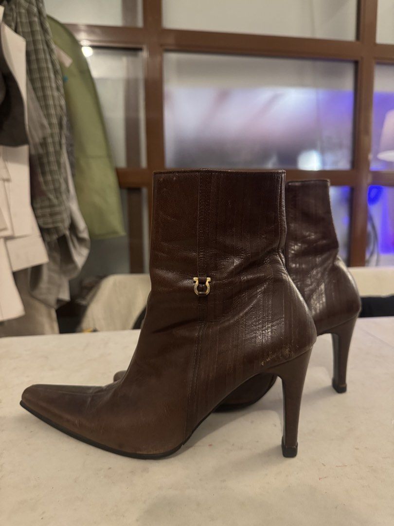 Vintage Brown Pointed Toe Boots (Category: Boots) located in Manila. Submitted by cococlio (Listing ID 1470121404, Image 2). Description: - Rich brown textured real leather boots -Ankle length - Chic pointed toe design - Slim stiletto heel with convenient side zipper - Subtle gold hardware accent near the top - Great height and very very sexy and flattering when worn -bought in japan :-)) 24CM.