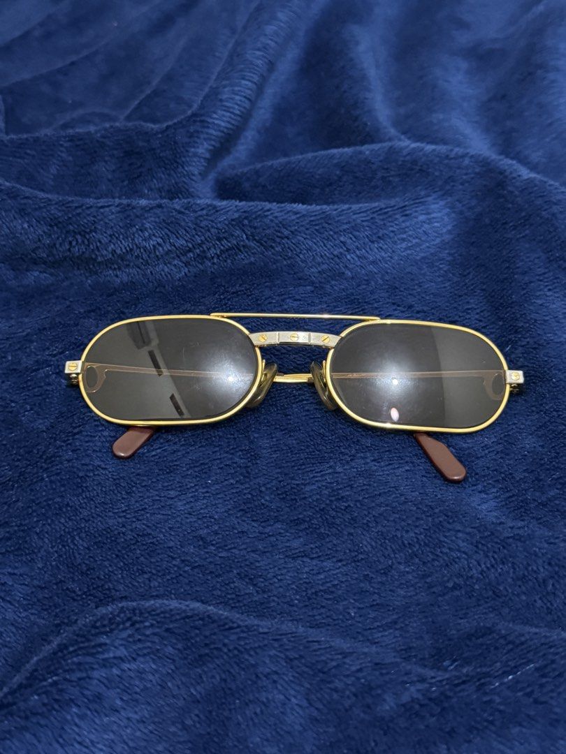 VINTAGE CARTIER SUNGLASSES (Category: Luxury Accessories) located in Santa Cruz. Submitted by hongkongmarketph (Listing ID 1470080321, Image 1). Description: AUTHENTIC VINTAGE CARTIER SUNGLASSES Original Cartier frame Very good condition with small signs of usage Lenses were replaced with prescription lenses, you will have to get it replaced again with your prescription or plain sunglasses lenses Does not come with any of the original packaging, 
