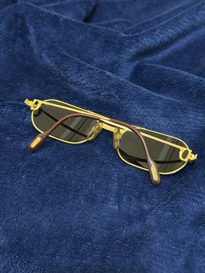 VINTAGE CARTIER SUNGLASSES (Category: Luxury Accessories) located in Santa Cruz. Submitted by hongkongmarketph (Listing ID 1470080321, Image 2). Description: AUTHENTIC VINTAGE CARTIER SUNGLASSES Original Cartier frame Very good condition with small signs of usage Lenses were replaced with prescription lenses, you will have to get it replaced again with your prescription or plain sunglasses lenses Does not come with any of the original packaging, 